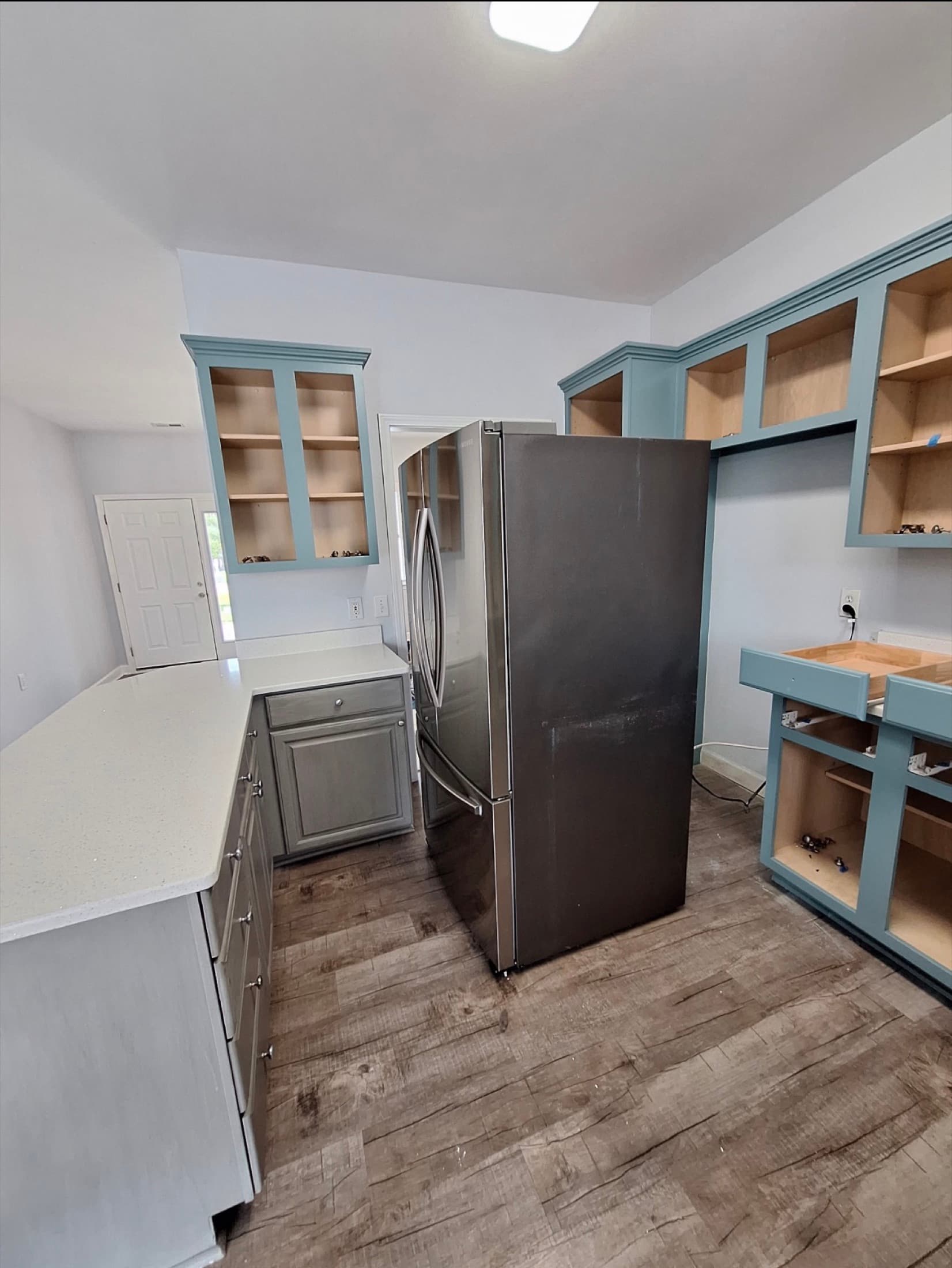 Cabinet boxes sprayed with doors removed